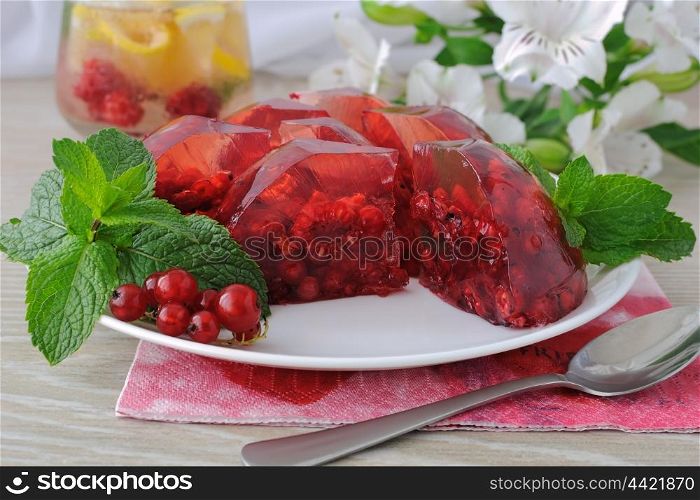 Berry jelly with fresh raspberries with red currants