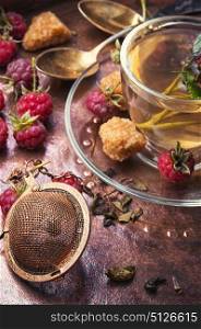 berry tea with raspberries. Autumn warming and anti-cold tea with raspberries