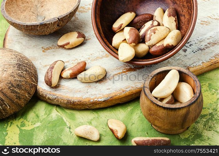 Bertholletia.Peeled brazil nut in wooden mortar.Healthy food. Brazil nut or bertholletia