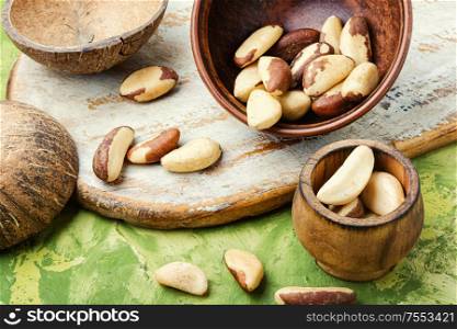 Bertholletia.Peeled brazil nut in wooden mortar.Healthy food. Brazil nut or bertholletia
