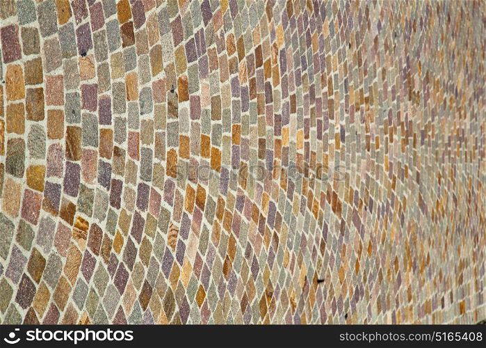 besnate street lombardy italy varese abstract pavement of a curch and marble