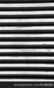 besnate window varese italy abstract wood venetian blind in the concrete brick