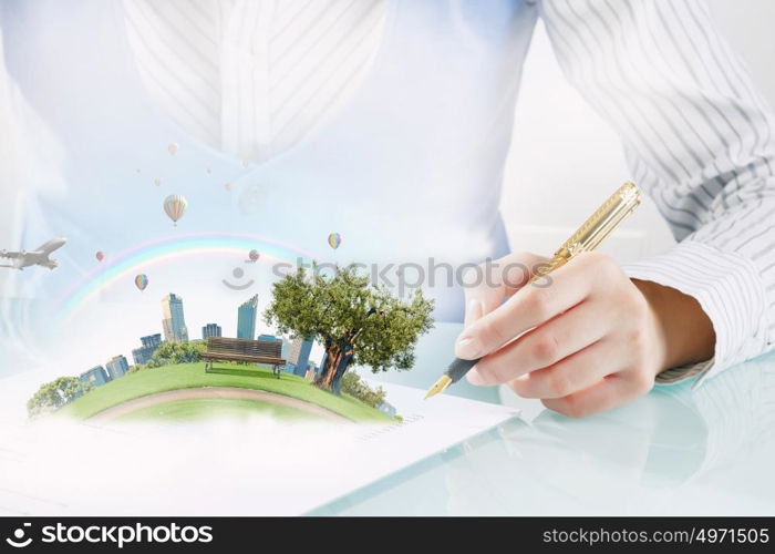 Best development project. Close view of businesswoman signing construction project documents