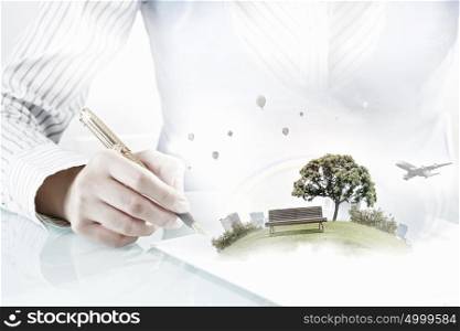 Best development project. Close view of businesswoman signing construction project documents