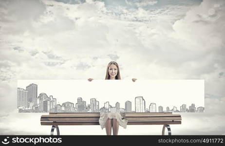 Best development project. Young businesswoman showing white banner with construction sketches