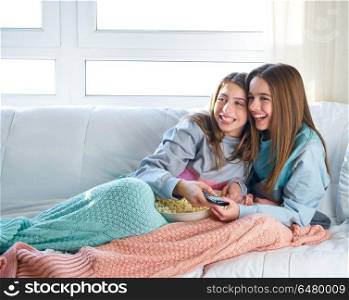 best friend girls watching TV cinema best friend girls watching . best friend girls watching TV cinema at home with popcorn
