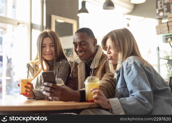 best friends hanging out while enjoying delicious drink