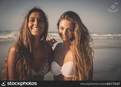 Best friends having fun on the beach 