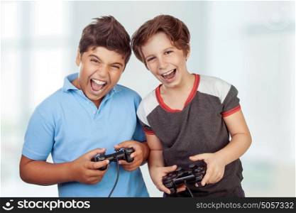 Best friends playing on playstation at home, crazy emotion of video games, two excited teen boys enjoying competition, laughing and screaming
