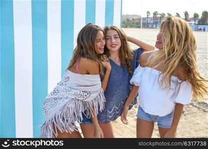 Best friends teen girls group happy in a summer blue stripes background