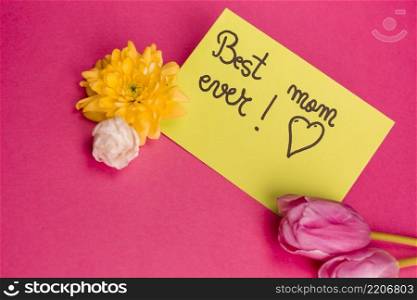 best mom ever title paper with flowers near
