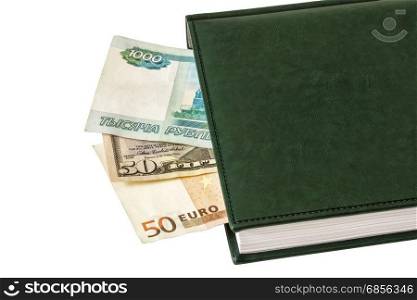 Between the sheets of the closed diary are visible parts of $ 50, 50 euros and 1000 Russian rubles
