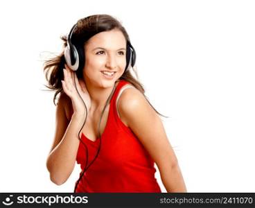 Beutiful girl listen music isolated on white