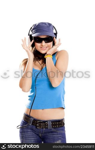Beutiful girl listen music with headphones isolated on white