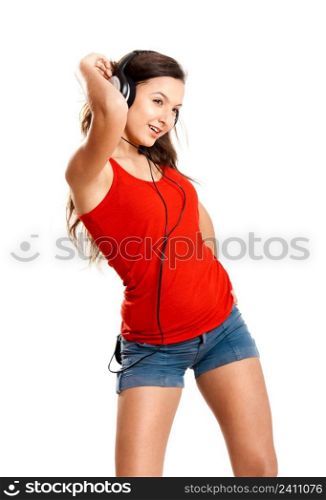 Beutiful young girl listen music isolated on white