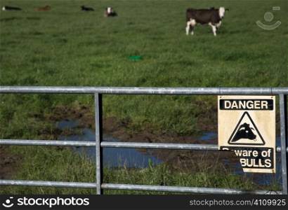Beware of the bull sign on gate of field in County Cork, Ireland