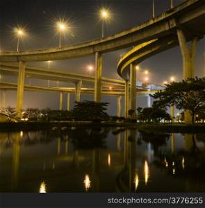 Bhumibol bridge illuminated at night in Bangkok, Thailand