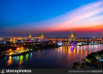 Bhumibol suspension bridge cross over Chao Phraya River at sunset in Bangkok city, Thailand