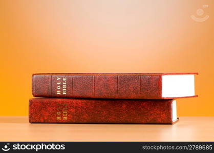 Bible books against the colorful gradient background