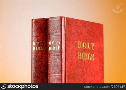 Bible books against the colorful gradient background