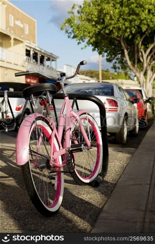 Bicycle and cars parked at the roadside, Lahaina, Maui, Hawaii Islands, USA