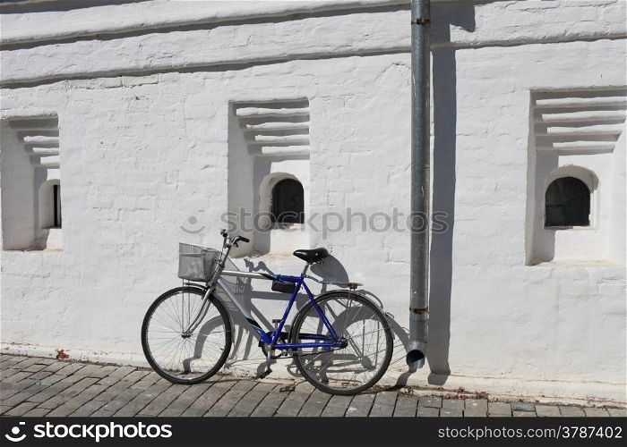 bicycle at a white wall