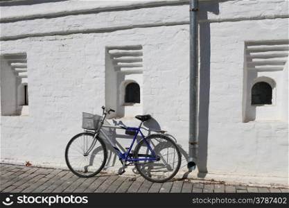 bicycle at a white wall
