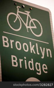 Bicycle lane direction sign to the Brooklyn Bridge in Manhattan, New York City, U.S.A.
