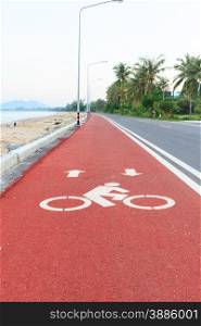 Bicycle lane or path, icon symbol on red asphalt road