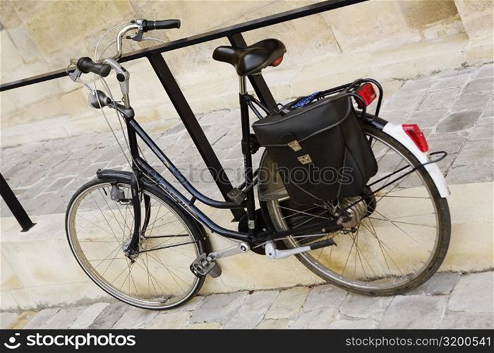 Bicycle leaning against a railing, Hotel De Ville, Bordeaux, Aquitaine, France