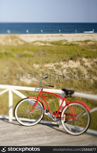 Bicycle leaning against rail on Bald Head Island, North Carolina