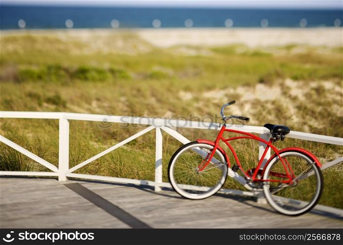 Bicycle leaning against rail on Bald Head Island, North Carolina