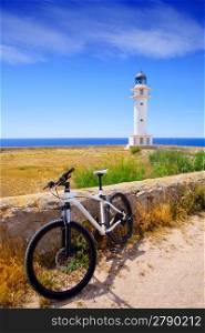 bicycle on Balearic island of Formentera near Barbaria cape Lighthouse