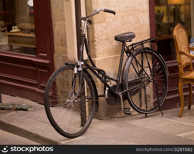 Bicycle on corner in Paris France