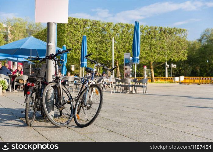 Bicycle parking in ancient European city. Summer tourism and travels, famous europe landmark, popular places. Bicycle parking in ancient European city