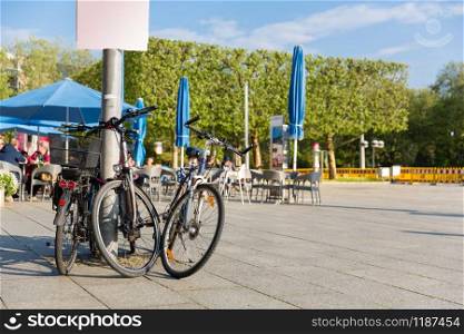 Bicycle parking in ancient European city. Summer tourism and travels, famous europe landmark, popular places. Bicycle parking in ancient European city