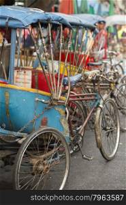 Bicycle Ricksha Taxis at the morning Market in Nothaburi in the north of city of Bangkok in Thailand in Southeastasia.. ASIA THAILAND BANGKOK NOTHABURI TRANSORT BICYCLE TAXI