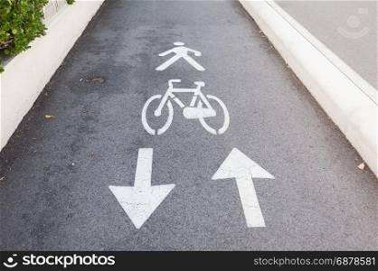 Bicycle road sign and arrow. A bike lane for cyclist.