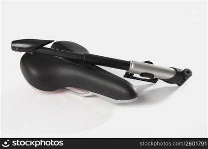 Bicycle seat with a hand pump