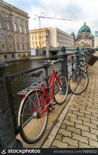 Bicycles by the River Spree near Berlin Cathedral, the Berliner Dom, Berlin, Germany