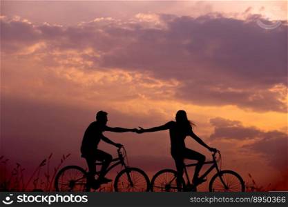bicycles couple silhouettes biking