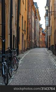 Bicycles leaning against a wall of a building, Gamla Stan, Stockholm, Sweden