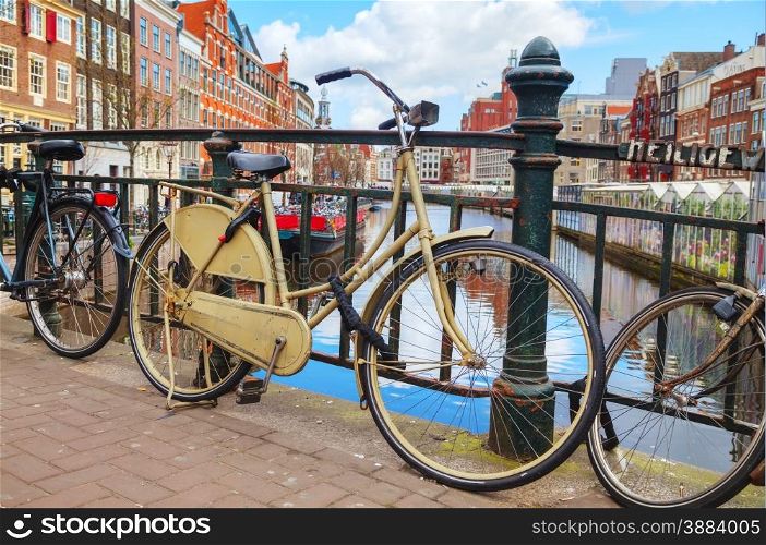 Bicycles parked near the floating flower market in Amsterdam, Netherlands