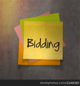 ""bidding" text on sticky note paper on wall texture"