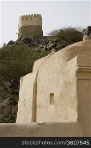 Bidyah, UAE, two watchtowers overlooking Al Bidyah Mosque built in 1446