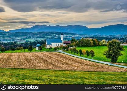 Biew of Bavaria autumn countryside rural scene - Pilgrimage church of Wilparting, Irschenberg village, Upper Bavaria, Germany. Church of Wilparting, Irschenberg, Upper Bavaria, Germany