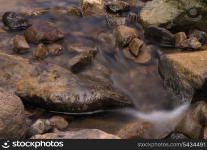 Big and small river&rsquo;s stones in mountain&rsquo;s stream