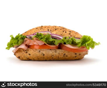 Big appetizing fast food baguette sandwich with lettuce, tomato, smoked ham and cheese isolated on white background. Junk food subway.