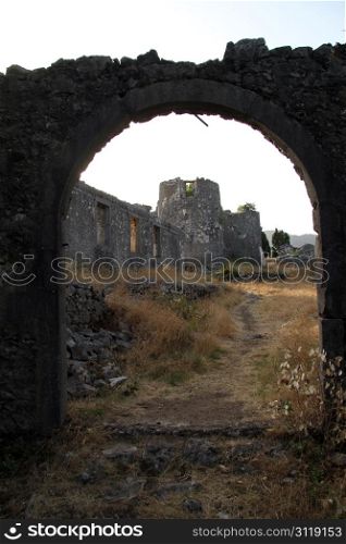 Big arc and ruins of fortress Besac near Virpazar, Montenegro