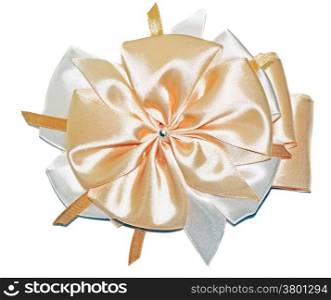 Big beautiful cream-colored bow isolated on white